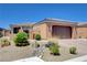 Charming single-story home featuring low-maintenance desert landscaping and a two-car garage at 3616 Greenbriar Bluff Ave, North Las Vegas, NV 89081