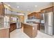 Stylish kitchen with stainless steel appliances, granite countertops, and tile backsplash at 3616 Greenbriar Bluff Ave, North Las Vegas, NV 89081