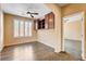 The office offers wood floors, storage, and a large window with shutters at 3616 Greenbriar Bluff Ave, North Las Vegas, NV 89081