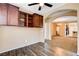 The office includes wood floors, storage, and leads to other rooms at 3616 Greenbriar Bluff Ave, North Las Vegas, NV 89081