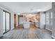 Bright living area showcasing stylish floors and a view into the modern kitchen at 3971 Foxboro Cir, Las Vegas, NV 89121