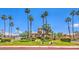 The Villas at the Estates features lush landscaping and a community building at 460 Strawflower Rd, Las Vegas, NV 89107