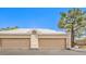Garage with a white tiled roof at 460 Strawflower Rd, Las Vegas, NV 89107