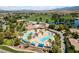 Aerial view of community pools, amenities, and landscaping at 5375 E La Campana Dr, Pahrump, NV 89061