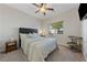 Bright bedroom with a window view, ceiling fan and a modern style at 5375 E La Campana Dr, Pahrump, NV 89061