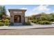 Community restaurant and resident facility entrance with stone architecture and well-manicured landscaping at 5375 E La Campana Dr, Pahrump, NV 89061