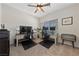 Home office setup with two desks, monitors, and neutral decor, perfect for productivity at 5375 E La Campana Dr, Pahrump, NV 89061