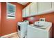 Functional laundry room with modern washer and dryer at 62 Myrtle Springs Ct, Las Vegas, NV 89148