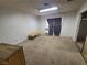 Bedroom features neutral walls, carpeted flooring, and natural light from the windows at 6215 Darby Ave, Las Vegas, NV 89146