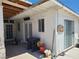 Exterior view of back porch, showcasing access points and a covered area at 6215 Darby Ave, Las Vegas, NV 89146