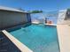 Sparkling backyard swimming pool surrounded by decking, perfect for relaxation and enjoyment at 6215 Darby Ave, Las Vegas, NV 89146