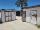 Backyard sheds with aged siding and concrete pads at 6215 Darby Ave, Las Vegas, NV 89146