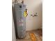 Kenmore water heater and plumbing fixtures inside of a home with tile floors at 6215 Darby Ave, Las Vegas, NV 89146