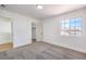 Bedroom featuring neutral carpet, white walls, and a closet at 6420 Rosemount Ave, Las Vegas, NV 89156