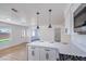 Bright kitchen with breakfast bar, and stainless appliances at 6420 Rosemount Ave, Las Vegas, NV 89156