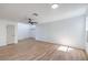 Spacious room with ceiling fan and wood-look floors at 6420 Rosemount Ave, Las Vegas, NV 89156