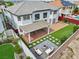 Backyard with a covered patio, seating area, and landscaped yard perfect for outdoor entertaining at 6639 Tranquil Seas Ct, Las Vegas, NV 89139