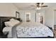 Spacious bedroom with hardwood floors, ceiling fan, neutral paint and closet at 6639 Tranquil Seas Ct, Las Vegas, NV 89139