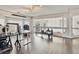 Bright and spacious bonus room with hardwood floors, natural light, and ample space for activities at 6639 Tranquil Seas Ct, Las Vegas, NV 89139