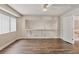 Large bonus room with hardwood floors, neutral paint and lots of natural light at 6639 Tranquil Seas Ct, Las Vegas, NV 89139