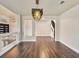Dining room view showcasing hardwood floors and a decorative lighting fixture at 6639 Tranquil Seas Ct, Las Vegas, NV 89139