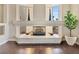 Close up of modern fireplace with marble accents, decorative vases and a cozy ambiance at 6639 Tranquil Seas Ct, Las Vegas, NV 89139