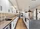 Spacious kitchen features sleek countertops, modern appliances, and custom backsplash at 6639 Tranquil Seas Ct, Las Vegas, NV 89139