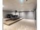 Home theater room with tiered seating and projector setup, designed for immersive entertainment experiences at 6639 Tranquil Seas Ct, Las Vegas, NV 89139