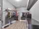 Walk-in closet providing ample storage space with built-in shelving and hanging racks at 6639 Tranquil Seas Ct, Las Vegas, NV 89139