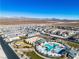 A top-down look at the community pool and recreation areas with mountains in the distance at 6952 Crescent Gold St, North Las Vegas, NV 89086
