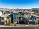 Aerial view of two story home in a suburban neighborhood at 6952 Crescent Gold St, North Las Vegas, NV 89086
