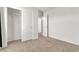 Bedroom with a walk-in closet and neutral carpet; bright and move-in ready at 6952 Crescent Gold St, North Las Vegas, NV 89086