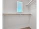 Bright closet with shelving and rod for optimal storage and organization at 6952 Crescent Gold St, North Las Vegas, NV 89086