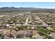 Aerial view of a neighborhood with landscaped yards, pools, and convenient access to the highway at 7221 Harlow St, Las Vegas, NV 89131