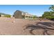 Spacious backyard with gravel landscaping, patio, and potential for outdoor enjoyment and customization at 7221 Harlow St, Las Vegas, NV 89131