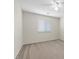 Cozy bedroom with natural light features a ceiling fan and a window at 7221 Harlow St, Las Vegas, NV 89131