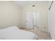 Bedroom with neutral carpet, walk in closet, and access to a bathroom at 7221 Harlow St, Las Vegas, NV 89131