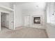 Bright bedroom with a fireplace feature and neutral carpet flooring, offering comfort and relaxation at 7221 Harlow St, Las Vegas, NV 89131