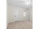 Simple yet comfortable bedroom with neutral paint, plush carpeting, and ample lighting at 7221 Harlow St, Las Vegas, NV 89131