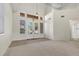 Inviting home foyer featuring high ceilings, ample natural light, and a stylish double-door entrance at 7221 Harlow St, Las Vegas, NV 89131