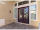 Elegant front door with glass panels and decorative accents, creating a welcoming entrance at 7221 Harlow St, Las Vegas, NV 89131