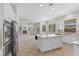 Open kitchen layout provides clear sightlines to the fireplace in the living room at 7221 Harlow St, Las Vegas, NV 89131