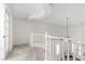 Loft area featuring a white railing and french doors leading to a balcony at 7221 Harlow St, Las Vegas, NV 89131