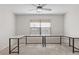 Bright office with expansive work surface, natural light, and neutral colored carpet at 7221 Harlow St, Las Vegas, NV 89131