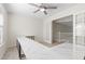Bright room featuring a long desk space, ceiling fan, and french doors at 7221 Harlow St, Las Vegas, NV 89131