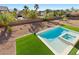 Bird's eye view of the pool and backyard, enhanced with desert landscaping at 7221 Harlow St, Las Vegas, NV 89131