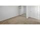 Neutral bedroom with a mirrored closet and standard trim, window and baseboard at 7249 Linaria Rd, Las Vegas, NV 89113
