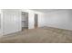Bedroom featuring two doors and neutral carpeting at 7249 Linaria Rd, Las Vegas, NV 89113