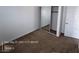 Bedroom featuring neutral carpet and a mirrored closet at 7249 Linaria Rd, Las Vegas, NV 89113