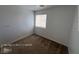 An empty bedroom features neutral carpet, a window, and fresh paint at 7249 Linaria Rd, Las Vegas, NV 89113